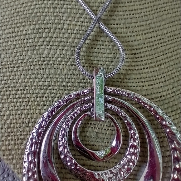 Women's silver tone runway statement necklace. - Picture 4 of 5